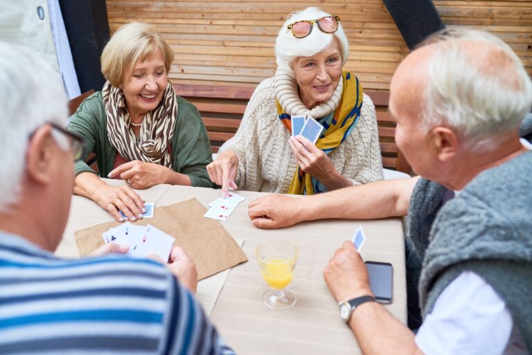 Senior Friends Playing Cards
