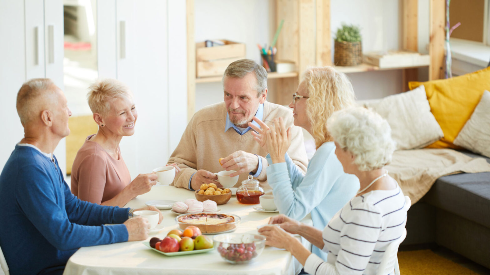 Older-adults-enjoying-social-time-at-The-Heartlands,-a-55-plus-community-offering-independent-and-assisted-living-options